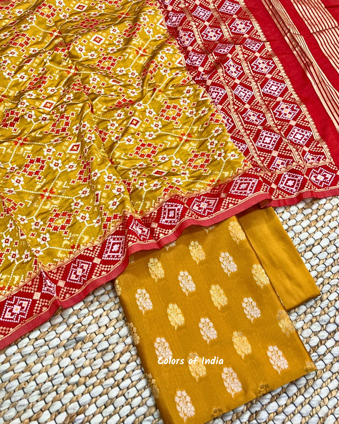 Party wear banarsi silk booti suit with patola dupatta